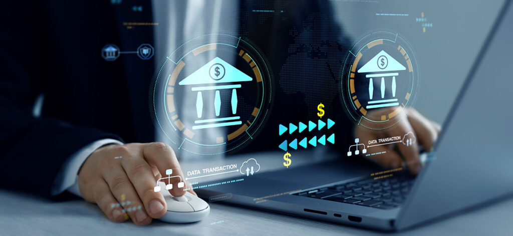 payment transaction between financial institutes overlay over man working at laptop